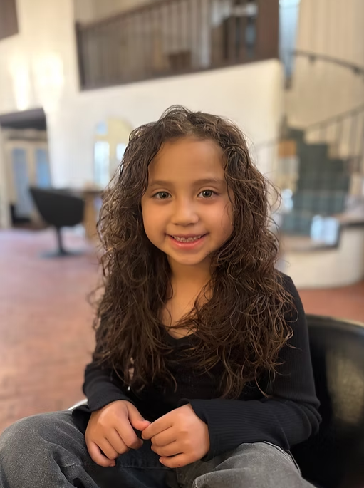 Professional children's curly hair styling by curly hair specialist Albuquerque